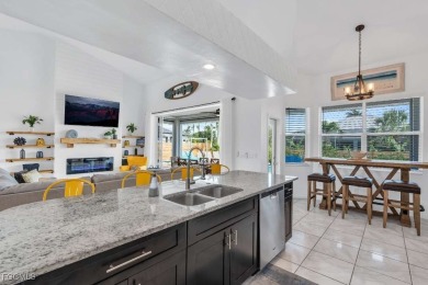 Welcome to 1720 SW 49th Ln, a charming 3-bedroom, 2-bathroom on Royal Tee Country Club in Florida - for sale on GolfHomes.com, golf home, golf lot