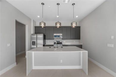 Experience the enchanting lifestyle of the sought-after Modern on Reunion Resort Golf Course in Florida - for sale on GolfHomes.com, golf home, golf lot
