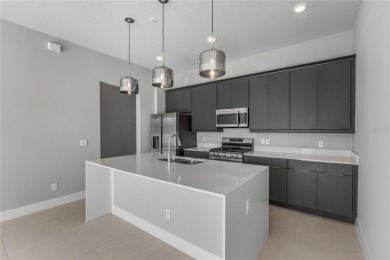 Experience the enchanting lifestyle of the sought-after Modern on Reunion Resort Golf Course in Florida - for sale on GolfHomes.com, golf home, golf lot