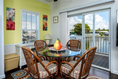 Experience the best of Florida living in this beautifully on Mangrove Bay Golf Course in Florida - for sale on GolfHomes.com, golf home, golf lot