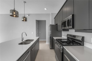 Experience the enchanting lifestyle of the sought-after Modern on Reunion Resort Golf Course in Florida - for sale on GolfHomes.com, golf home, golf lot