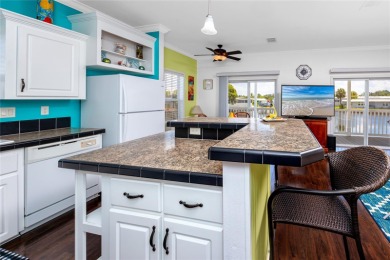 Experience the best of Florida living in this beautifully on Mangrove Bay Golf Course in Florida - for sale on GolfHomes.com, golf home, golf lot