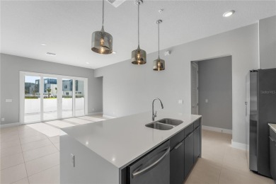 Experience the enchanting lifestyle of the sought-after Modern on Reunion Resort Golf Course in Florida - for sale on GolfHomes.com, golf home, golf lot