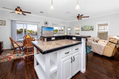 Experience the best of Florida living in this beautifully on Mangrove Bay Golf Course in Florida - for sale on GolfHomes.com, golf home, golf lot