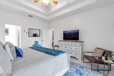 Welcome to 1720 SW 49th Ln, a charming 3-bedroom, 2-bathroom on Royal Tee Country Club in Florida - for sale on GolfHomes.com, golf home, golf lot