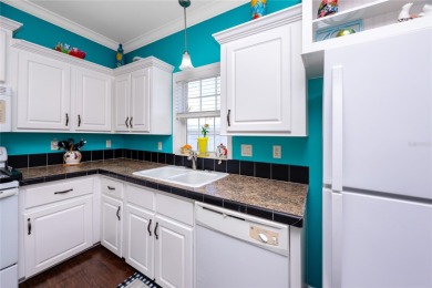 Experience the best of Florida living in this beautifully on Mangrove Bay Golf Course in Florida - for sale on GolfHomes.com, golf home, golf lot