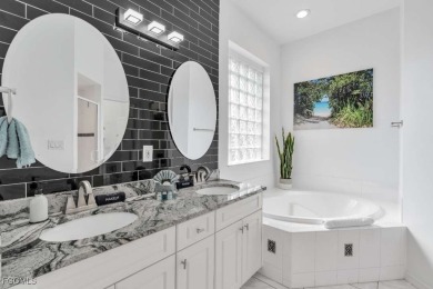 Welcome to 1720 SW 49th Ln, a charming 3-bedroom, 2-bathroom on Royal Tee Country Club in Florida - for sale on GolfHomes.com, golf home, golf lot