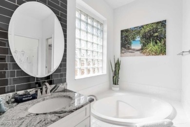Welcome to 1720 SW 49th Ln, a charming 3-bedroom, 2-bathroom on Royal Tee Country Club in Florida - for sale on GolfHomes.com, golf home, golf lot