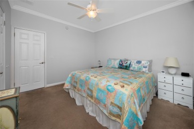 Experience the best of Florida living in this beautifully on Mangrove Bay Golf Course in Florida - for sale on GolfHomes.com, golf home, golf lot