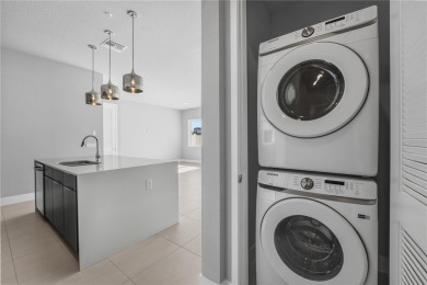 Experience the enchanting lifestyle of the sought-after Modern on Reunion Resort Golf Course in Florida - for sale on GolfHomes.com, golf home, golf lot