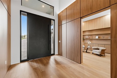 A contemporary Mediterranean lakefront masterpiece, this on Bella Collina Golf Club in Florida - for sale on GolfHomes.com, golf home, golf lot