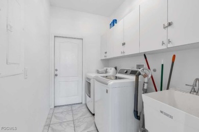 Welcome to 1720 SW 49th Ln, a charming 3-bedroom, 2-bathroom on Royal Tee Country Club in Florida - for sale on GolfHomes.com, golf home, golf lot