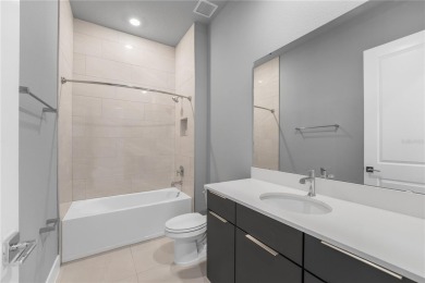 Experience the enchanting lifestyle of the sought-after Modern on Reunion Resort Golf Course in Florida - for sale on GolfHomes.com, golf home, golf lot