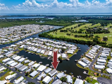 Experience the best of Florida living in this beautifully on Mangrove Bay Golf Course in Florida - for sale on GolfHomes.com, golf home, golf lot