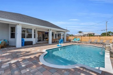 Welcome to 1720 SW 49th Ln, a charming 3-bedroom, 2-bathroom on Royal Tee Country Club in Florida - for sale on GolfHomes.com, golf home, golf lot