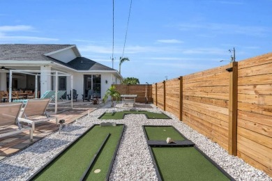 Welcome to 1720 SW 49th Ln, a charming 3-bedroom, 2-bathroom on Royal Tee Country Club in Florida - for sale on GolfHomes.com, golf home, golf lot