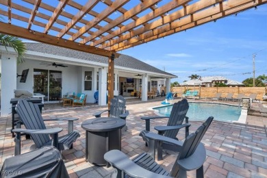 Welcome to 1720 SW 49th Ln, a charming 3-bedroom, 2-bathroom on Royal Tee Country Club in Florida - for sale on GolfHomes.com, golf home, golf lot