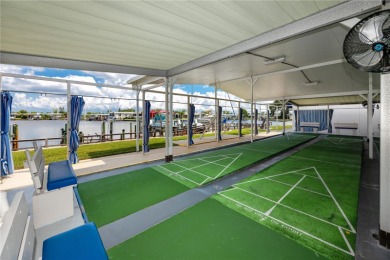 Experience the best of Florida living in this beautifully on Mangrove Bay Golf Course in Florida - for sale on GolfHomes.com, golf home, golf lot