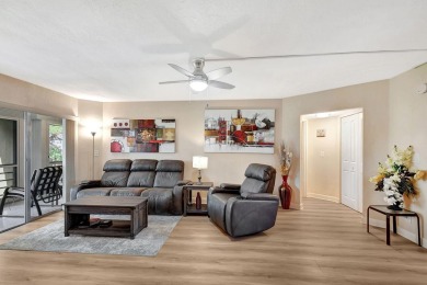 A FULLY RENOVATED PENTHOUSE CONDO...UPDATED WITH GREAT TASTE! on Poinciana Golf Club in Florida - for sale on GolfHomes.com, golf home, golf lot