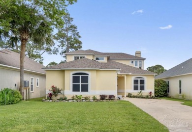 Luxury meets lifestyle in this stunning 3 bed, 3 bath, two-story on Tiger Point Golf and Country Club in Florida - for sale on GolfHomes.com, golf home, golf lot