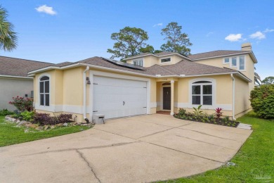 Luxury meets lifestyle in this stunning 3 bed, 3 bath, two-story on Tiger Point Golf and Country Club in Florida - for sale on GolfHomes.com, golf home, golf lot