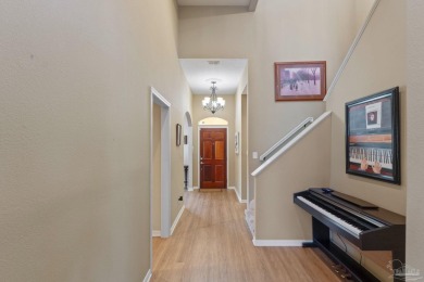 Luxury meets lifestyle in this stunning 3 bed, 3 bath, two-story on Tiger Point Golf and Country Club in Florida - for sale on GolfHomes.com, golf home, golf lot