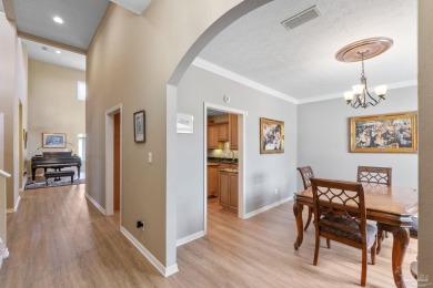 Luxury meets lifestyle in this stunning 3 bed, 3 bath, two-story on Tiger Point Golf and Country Club in Florida - for sale on GolfHomes.com, golf home, golf lot