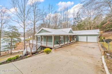 Beautiful lakefront basement/ranch home with plenty of space on The Greens at Deerfield in Tennessee - for sale on GolfHomes.com, golf home, golf lot