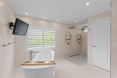 Nestled within the prestigious Wellington Aero Club on a quiet on The Wanderers Club in Florida - for sale on GolfHomes.com, golf home, golf lot