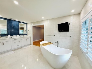 Nestled within the prestigious Wellington Aero Club on a quiet on The Wanderers Club in Florida - for sale on GolfHomes.com, golf home, golf lot