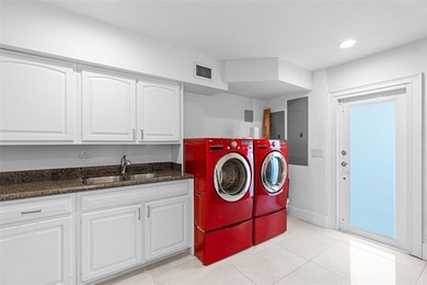 Nestled within the prestigious Wellington Aero Club on a quiet on The Wanderers Club in Florida - for sale on GolfHomes.com, golf home, golf lot