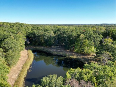 This fully furnished cottage can be your personal oasis or a on Garland Resort and Golf Club  in Michigan - for sale on GolfHomes.com, golf home, golf lot