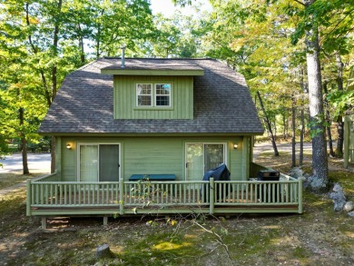 This fully furnished cottage can be your personal oasis or a on Garland Resort and Golf Club  in Michigan - for sale on GolfHomes.com, golf home, golf lot