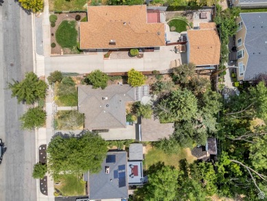 This beautifully maintained historic bungalow with a finished on Forest Dale Golf Club in Utah - for sale on GolfHomes.com, golf home, golf lot
