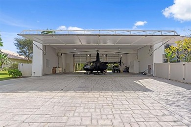 Nestled within the prestigious Wellington Aero Club on a quiet on The Wanderers Club in Florida - for sale on GolfHomes.com, golf home, golf lot