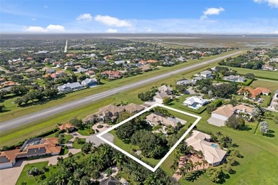 Nestled within the prestigious Wellington Aero Club on a quiet on The Wanderers Club in Florida - for sale on GolfHomes.com, golf home, golf lot