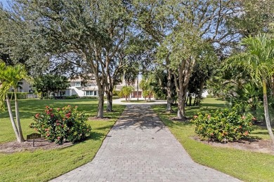 Nestled within the prestigious Wellington Aero Club on a quiet on The Wanderers Club in Florida - for sale on GolfHomes.com, golf home, golf lot