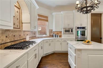 Tucked into a quiet cul-de-sac street within one of Suwanee's on Laurel Springs Golf Club in Georgia - for sale on GolfHomes.com, golf home, golf lot
