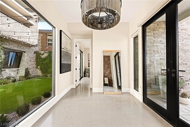 62 Grey Feather is a striking modern residence located within on Bears Best Las Vegas Golf Club in Nevada - for sale on GolfHomes.com, golf home, golf lot