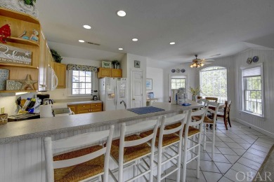 Discover your perfect Outer Banks summer retreat in this on The Currituck Golf Club in North Carolina - for sale on GolfHomes.com, golf home, golf lot