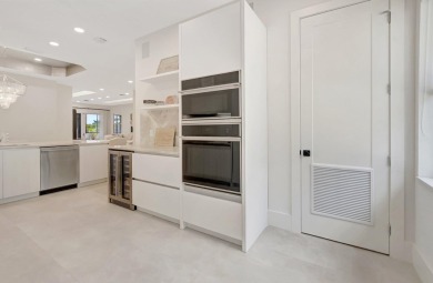 Arrive in style via your private elevator to a residence that on Boca Delray Golf and Country Club in Florida - for sale on GolfHomes.com, golf home, golf lot