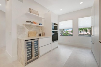 Arrive in style via your private elevator to a residence that on Boca Delray Golf and Country Club in Florida - for sale on GolfHomes.com, golf home, golf lot