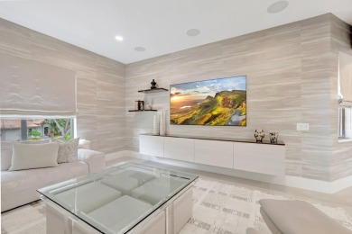 Arrive in style via your private elevator to a residence that on Boca Delray Golf and Country Club in Florida - for sale on GolfHomes.com, golf home, golf lot