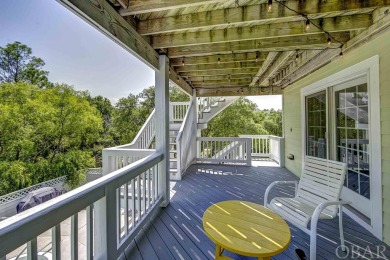 Discover your perfect Outer Banks summer retreat in this on The Currituck Golf Club in North Carolina - for sale on GolfHomes.com, golf home, golf lot