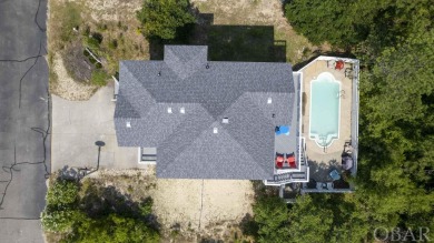 Discover your perfect Outer Banks summer retreat in this on The Currituck Golf Club in North Carolina - for sale on GolfHomes.com, golf home, golf lot