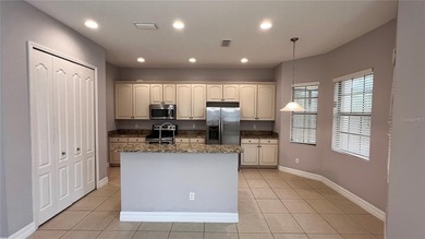 One or more photo(s) has been virtually staged. One or more on Eagle Creek Golf Club in Florida - for sale on GolfHomes.com, golf home, golf lot