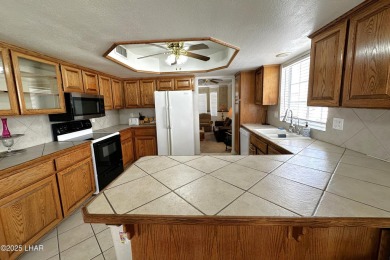 Spacious golf course home on the fairway with pool and spa on London Bridge Golf Course in Arizona - for sale on GolfHomes.com, golf home, golf lot