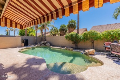 This beautifully updated single story home with Pebbletech pool on Arrowhead Country Club in Arizona - for sale on GolfHomes.com, golf home, golf lot