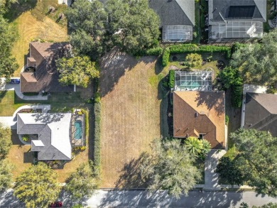 Build your dream home on this large residential lot in the on Harbor Hills Country Club in Florida - for sale on GolfHomes.com, golf home, golf lot