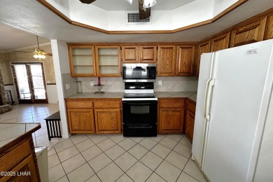 Spacious golf course home on the fairway with pool and spa on London Bridge Golf Course in Arizona - for sale on GolfHomes.com, golf home, golf lot